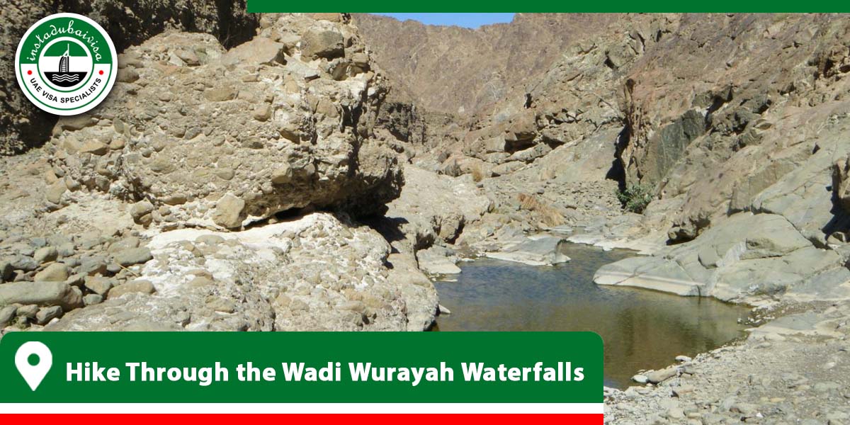 hike through the wadi wurayah waterfalls from instadubaivisa